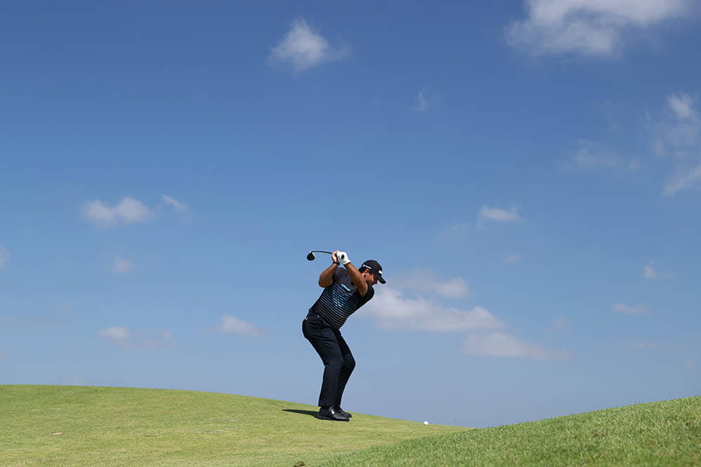 Patrick Reed playing on the 7th